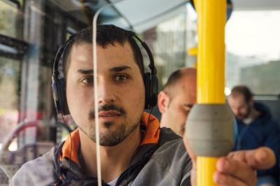 User of the urban transport service of Lugo during a trip
