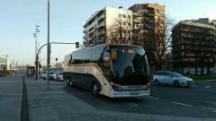 Monbus bus driving Real Madrid basketball team.