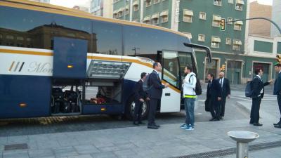 Real Madrid basketball team getting on a Monbus bus .