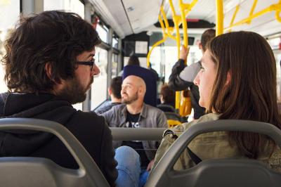 Travelers on a urban bus of Monbus