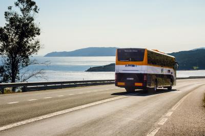 Bus of Monbus on tour by the Galician Coast