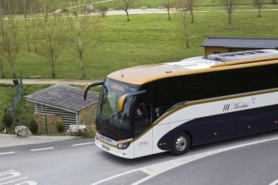 Monbus bus running through Lugo